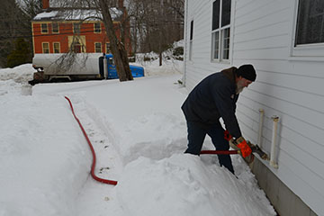 Heating Oil Driver Making Delivery